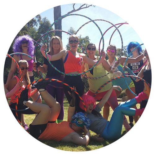 Ladies posing with their hula hoops after a Hoop Sparx Hoopy Hens Party in St Kilda