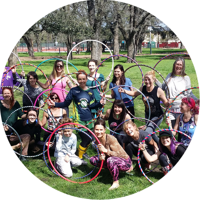 Hula Hoopers in Melbourne posing with their hoops on World Hoop Day