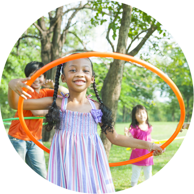 Kids Hula Hooping at a Hoop Sparx Holiday Program