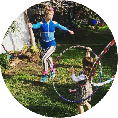 Donna Sparx teaching kids hula hoop dance at a hula hoop children's birthday party